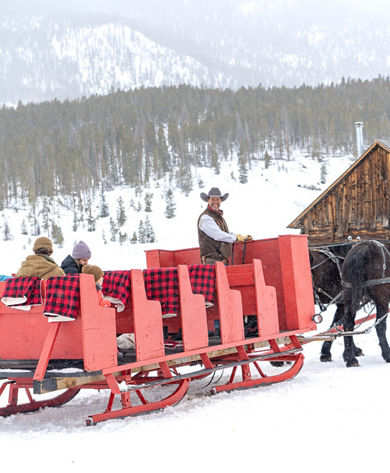 Family Enjoying Sleigh Ride through Keystone Resort
