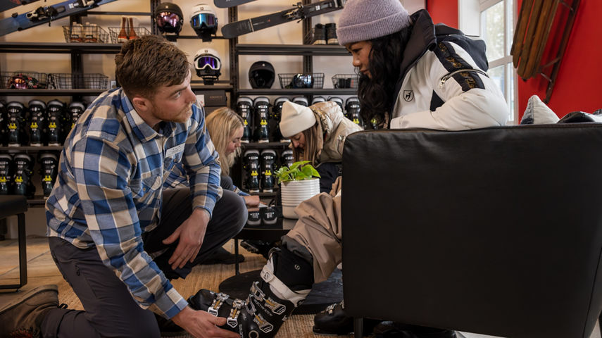 Resort Guests Receive Assistance with Boot Fitting at Whistler Blackcomb