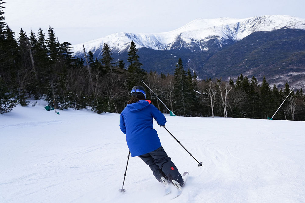 Employees Ski Downhill at Wildcat