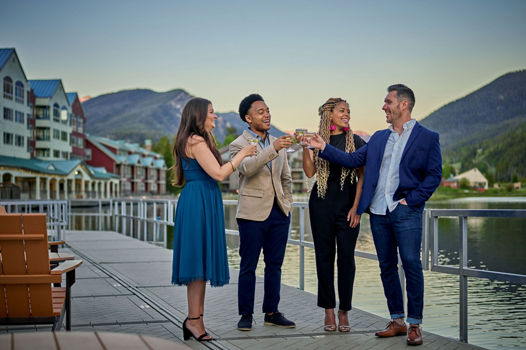 Group of Colleagues Enjoying Cocktails on a Summer Day at Keystone