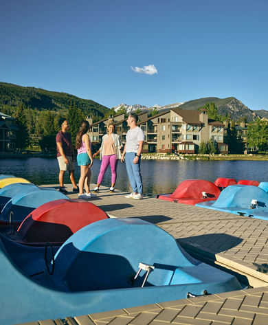 Family Walking Around Lakeside Village at Keystone on a Summer Day