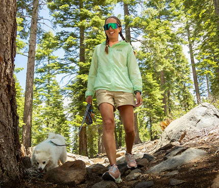 Woman and Dog Enjoy the Summer Hiking at Northstar
