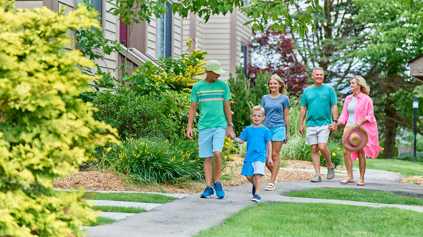 Family Enjoys Summer Stroll Through Seven Springs Mountain Villas 