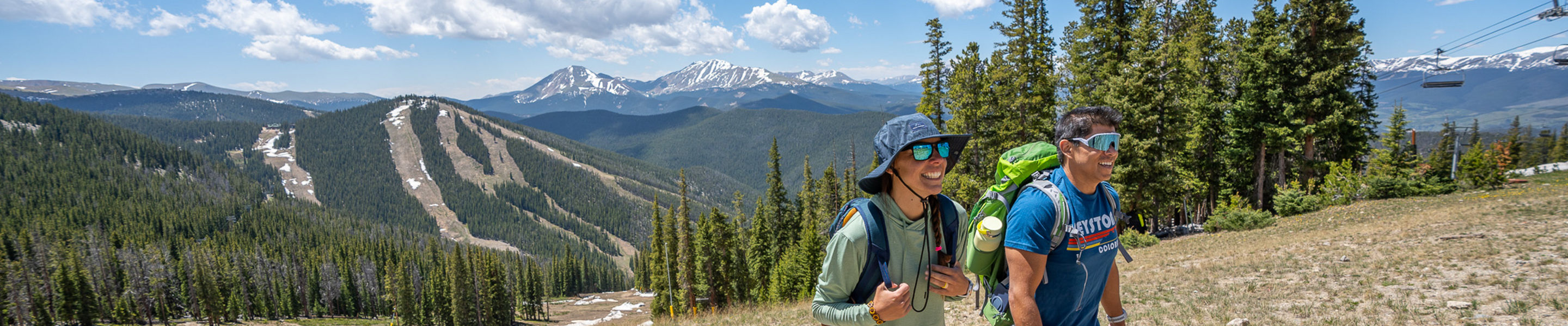 Couple Hiking Up Dercum Mountain at Keystone During Summer