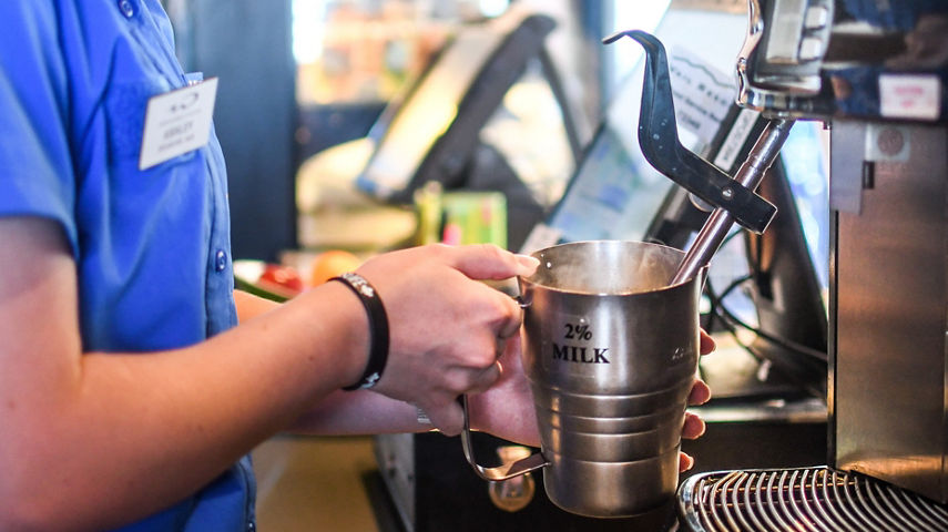 Barista Preparing a Customer's Order at Rendezvous Cappuccino Bar at Whistler Blackcomb
