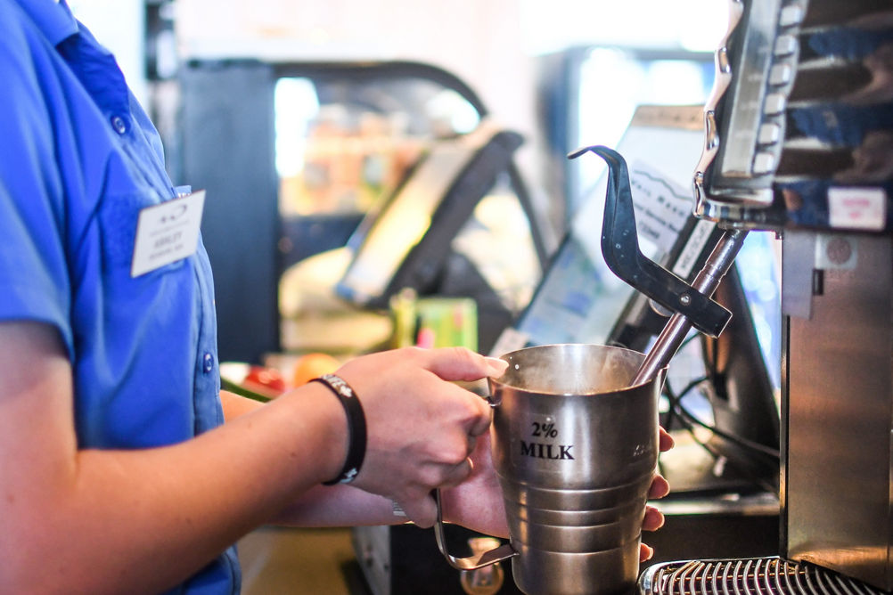 Barista Preparing a Customer's Order at Rendezvous Cappuccino Bar at Whistler Blackcomb