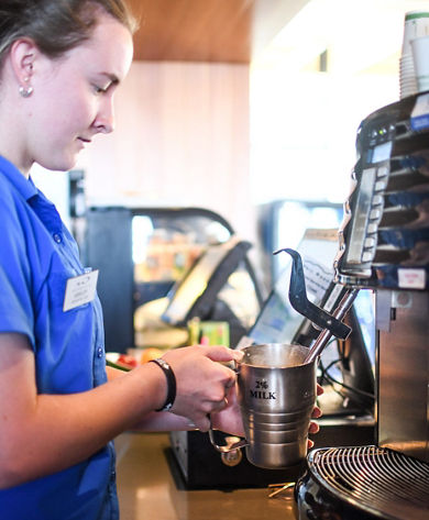 Barista Preparing a Customer's Order at Rendezvous Cappuccino Bar at Whistler Blackcomb