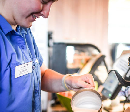 Barista Preparing a Customer's Order at Rendezvous Cappuccino Bar at Whistler Blackcomb