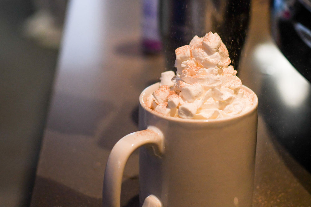 Barista Preparing a Customer's Order at Rendezvous Cappuccino Bar at Whistler Blackcomb