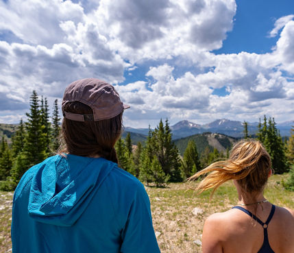 Friends Hiking Dercum Mountain Trail at Keystone