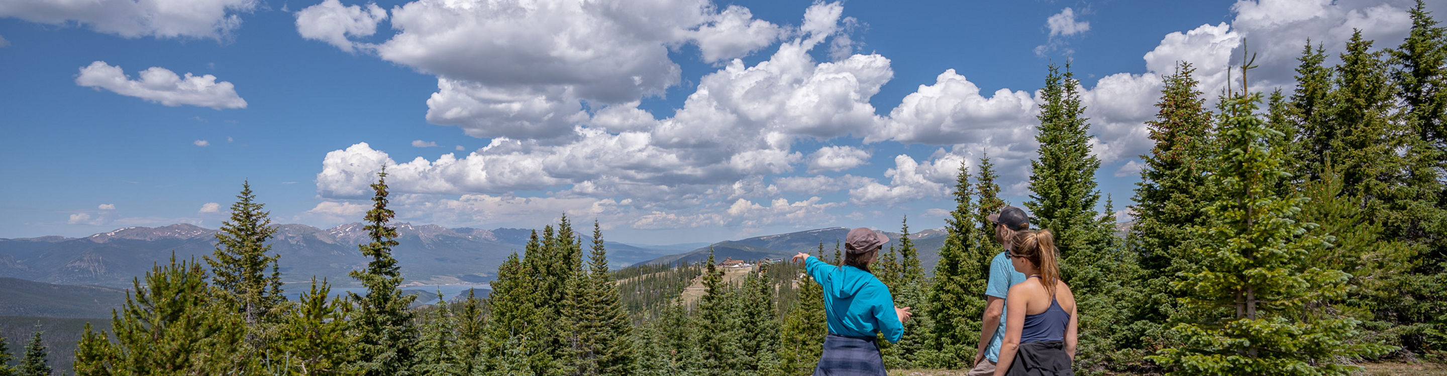 Friends Hiking Dercum Mountain Trail at Keystone