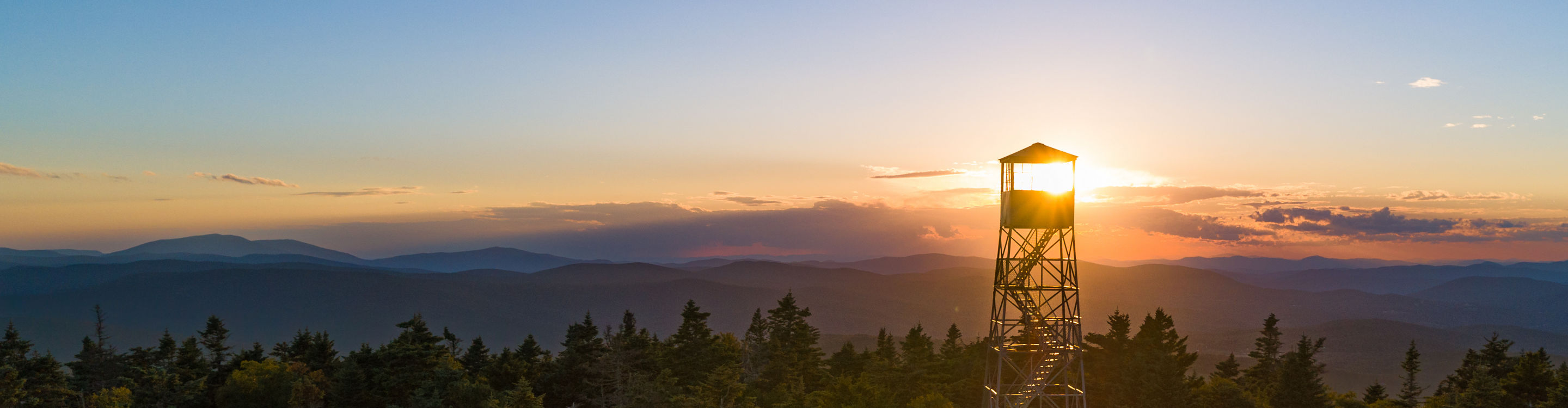 Sunset Landscape View of Tower During Summer at Okemo