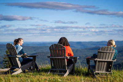 Friends Enjoy Summer Scenic Views During Sunset at Okemo
