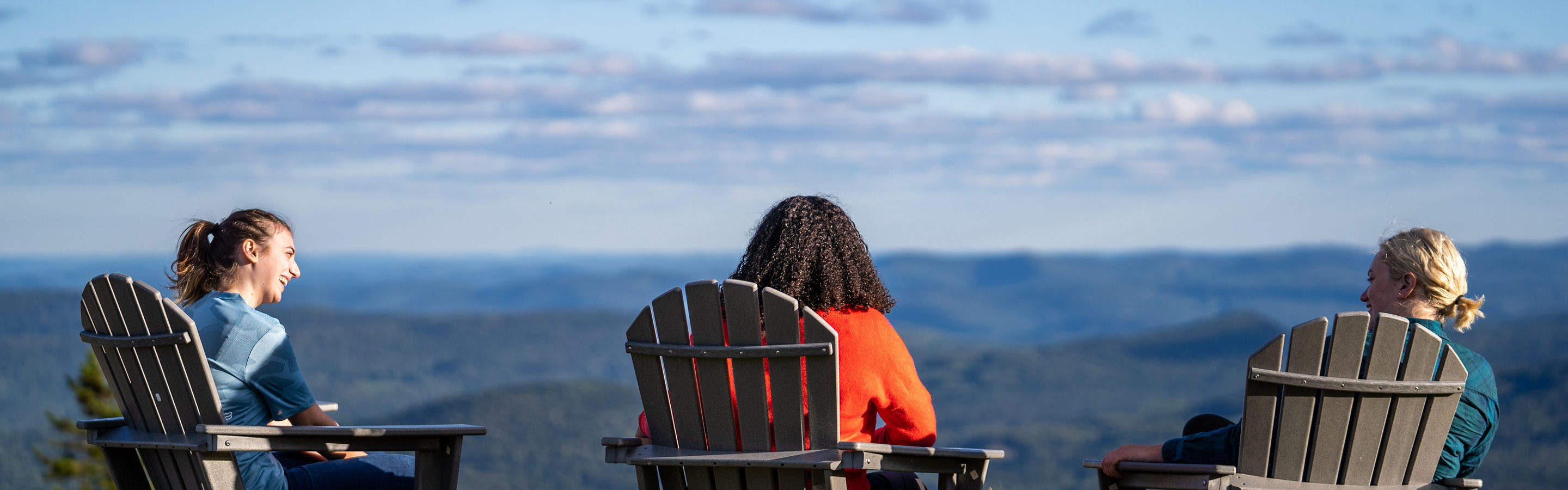 Friends Enjoy Summer Scenic Views During Sunset at Okemo