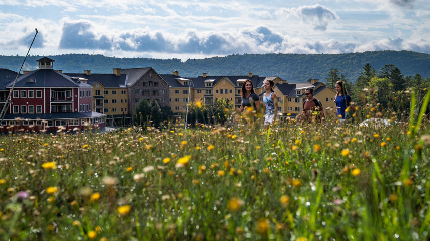Family Hiking Outside a Jackson Gore Inn at Okemo During Summer