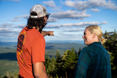 Friends Enjoy Summer Scenic Views During Sunset at Okemo