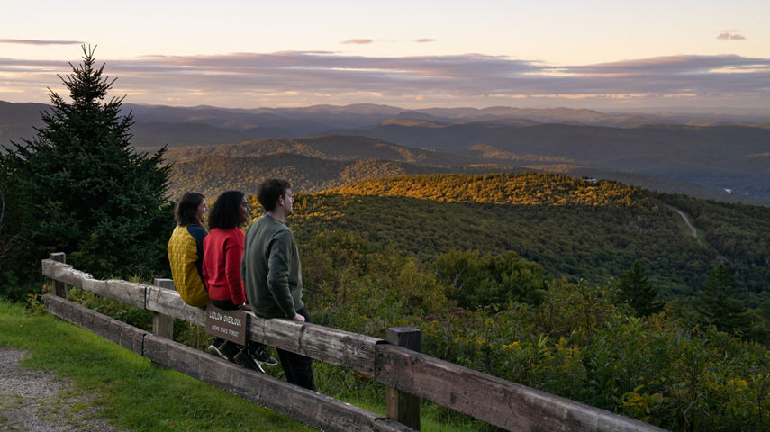 Friends Enjoy Summer Scenic Views During Sunset at Okemo