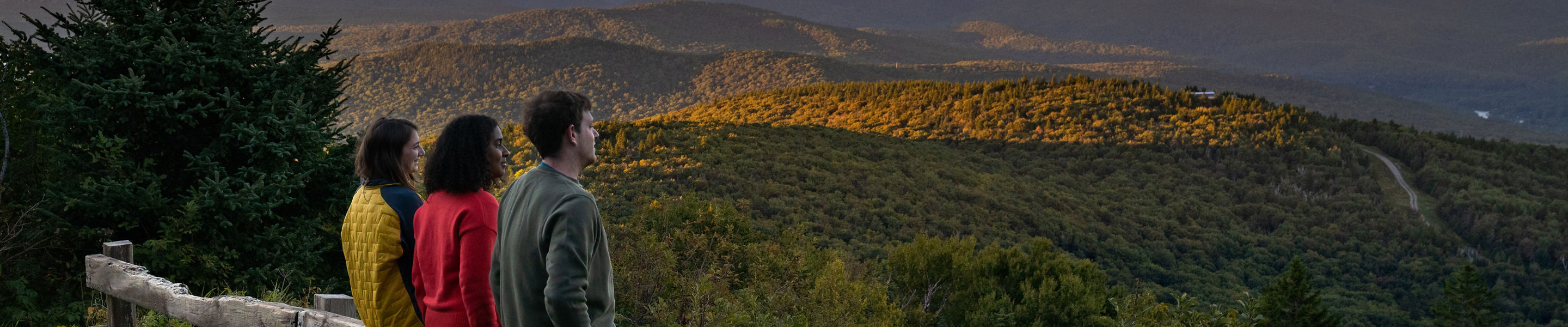 Friends Enjoy Summer Scenic Views During Sunset at Okemo