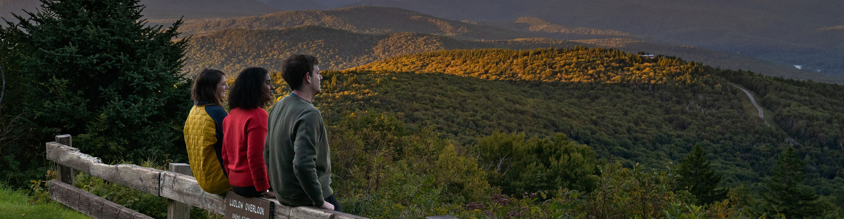 Friends Enjoy Summer Scenic Views During Sunset at Okemo