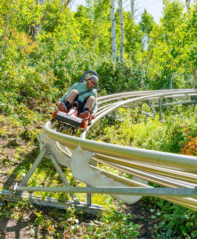 Guest Enjoys Park City Alpine Slide