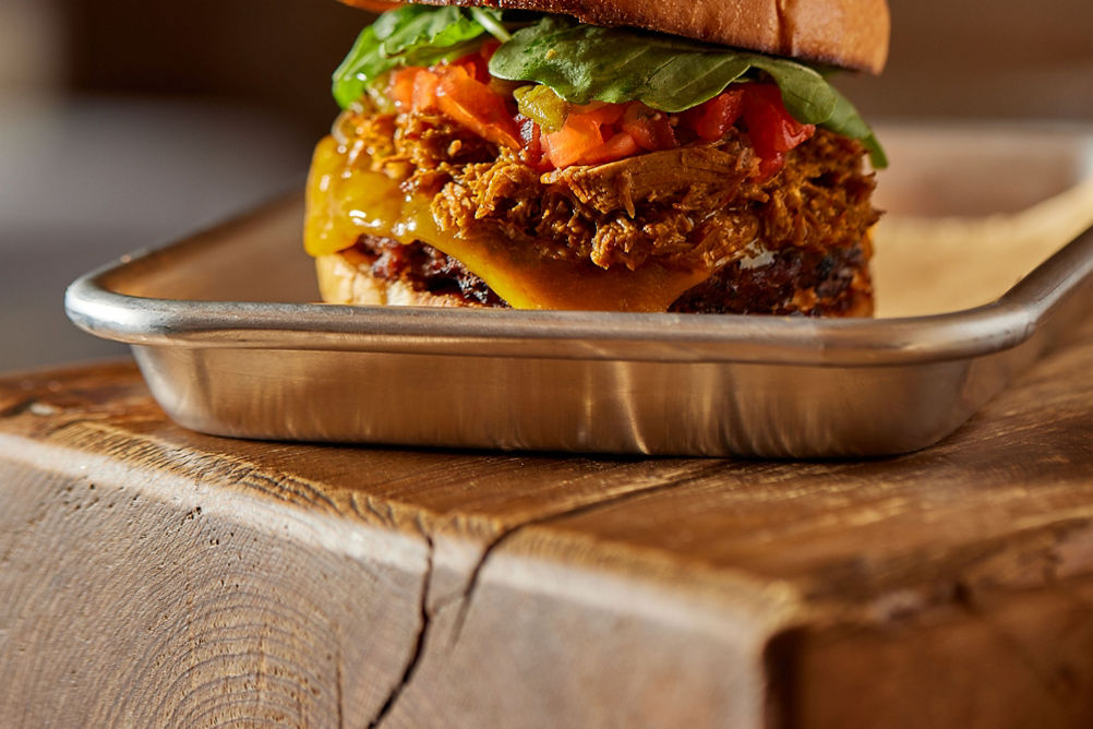 Pork Green Chile Topped Burger at Keystone Summit House