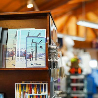 Mount Sunapee Postcard Display at Mountaineer Outfitters Retail Shop