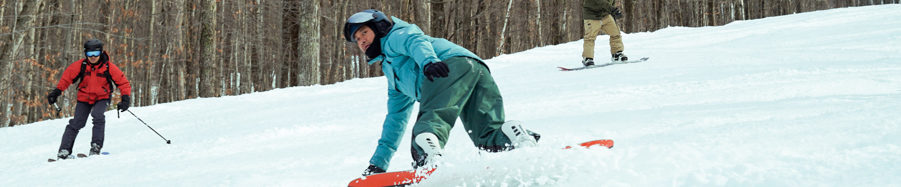 Group of Friends Skiing and Riding at Mount Sunapee