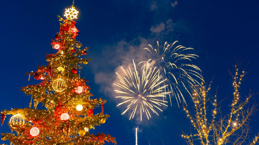 Fireworks in the Sky above a Christmas Tree at Park City 
