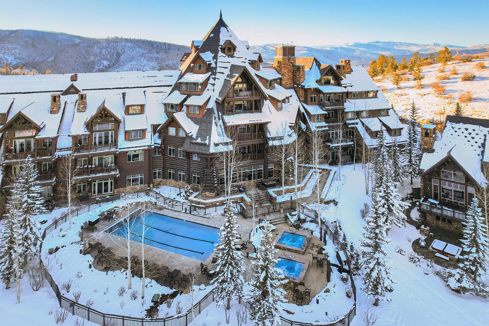 Aerial View of Horizon Pass Lodge Exterior and Outdoor Amenities During Winter Time at Beaver Creek