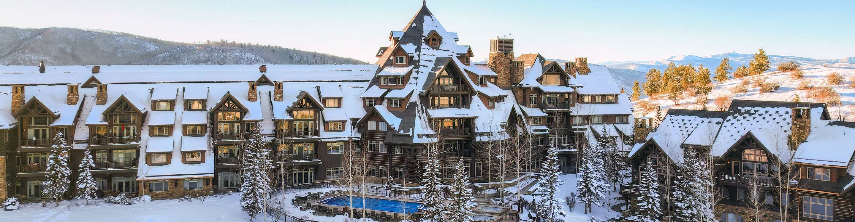 Aerial View of Horizon Pass Lodge Exterior and Outdoor Amenities During Winter Time at Beaver Creek