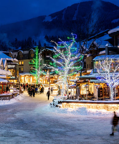 Resort Guests Stroll Whistler Blackcomb Village at Night