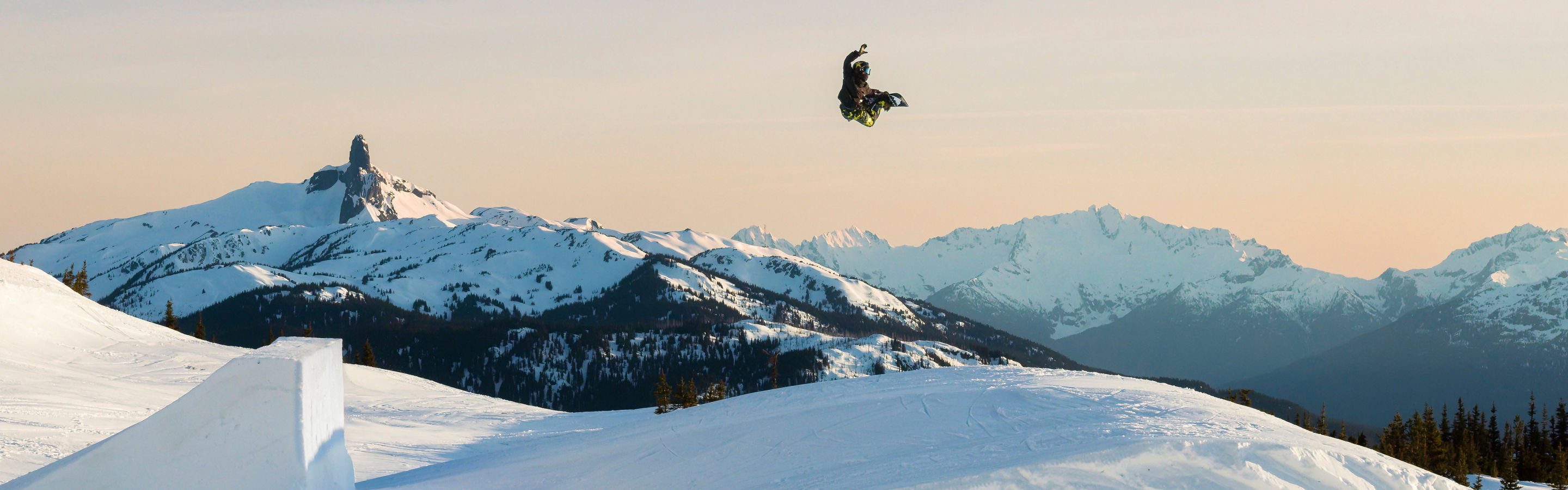 Snowboarders Jump at Whistler Blackcomb Terrain Park