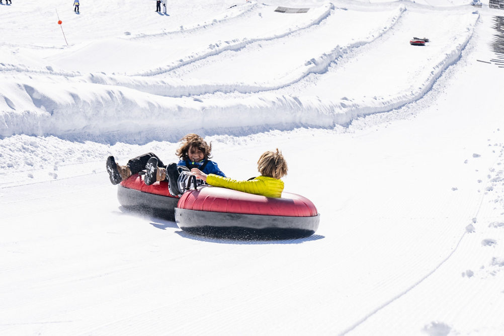 Tubing During a Bluebird Day at Heavenly