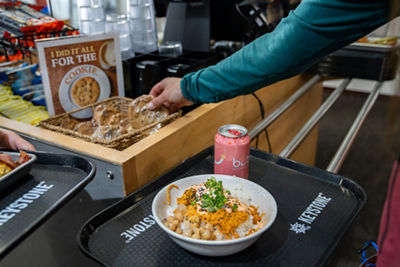 Customer Grabs a Cookie in Food Line at Keystone's Summit House
