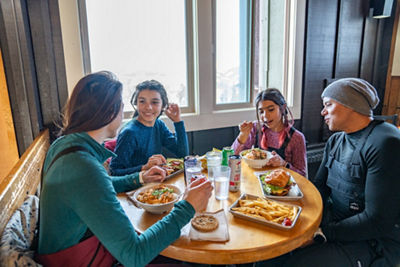 Family Enjoys Lunch in Between Skiing at Keyston'e Summit House