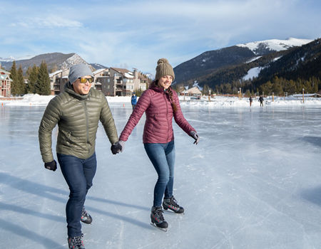 Ice Skating Couple on Lakeside rink at Keystone