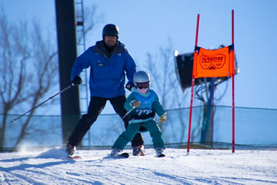 Child Takes Ski Lesson at Mad River Mountain