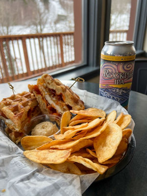 Chicken and Waffle Sandwich with a Beer at Wildcat Pub