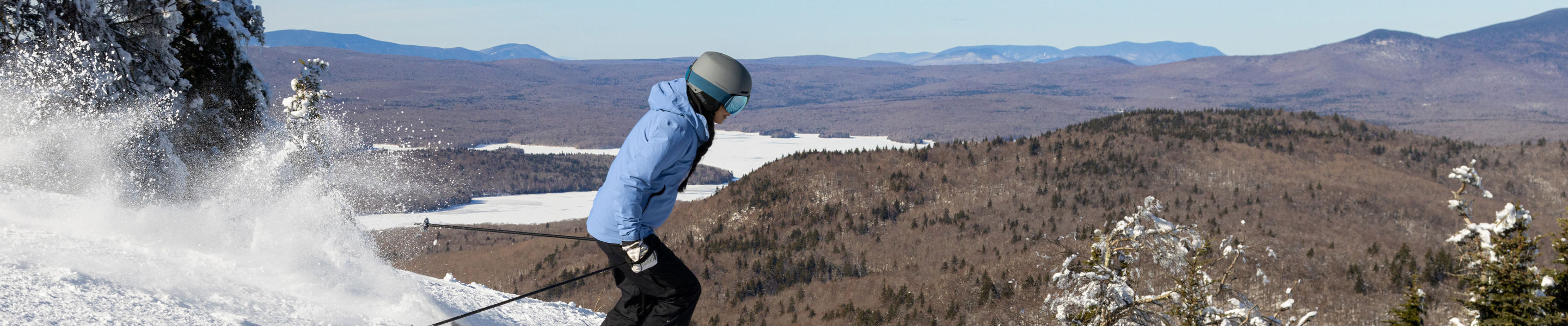 Woman Skiing Down Mountain at Mount Snow