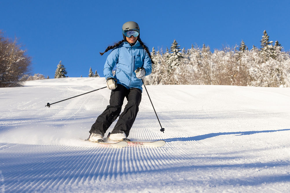 Woman Skiing Down Mountain at Mount Snow
