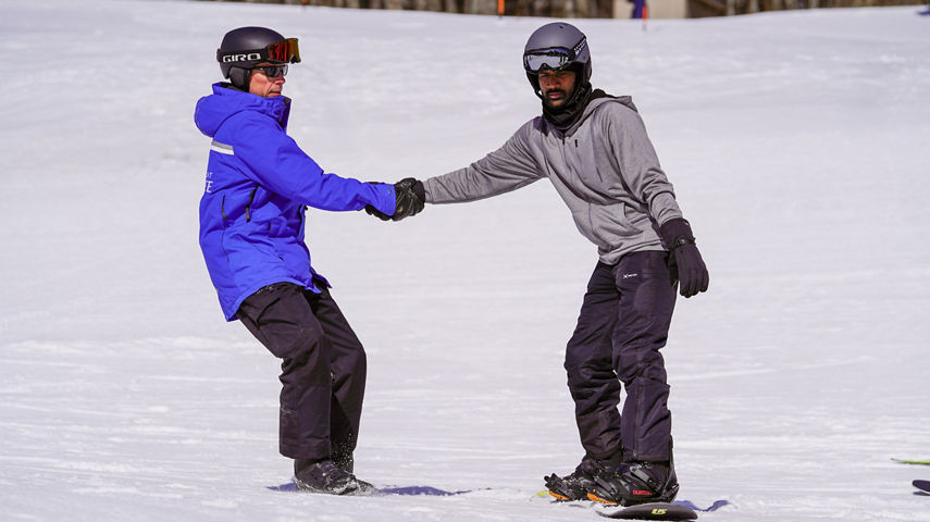 Ski Instructor Guides Adult at Mount Sunapee Ski Ride School