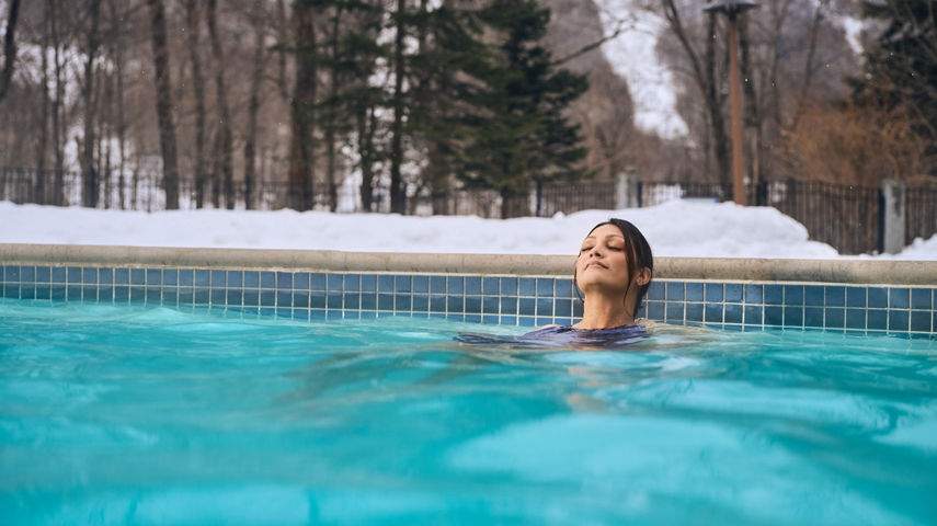 Woman Relaxing in Outdoor Hot Tub at Stowe