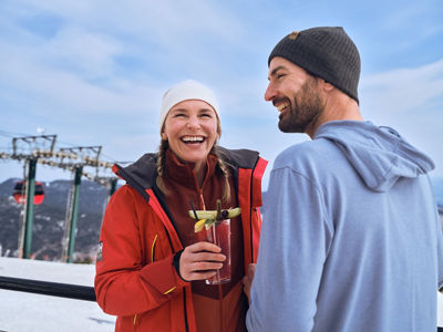 Couple Enjoying Apres on a Snowy Day at Stowe