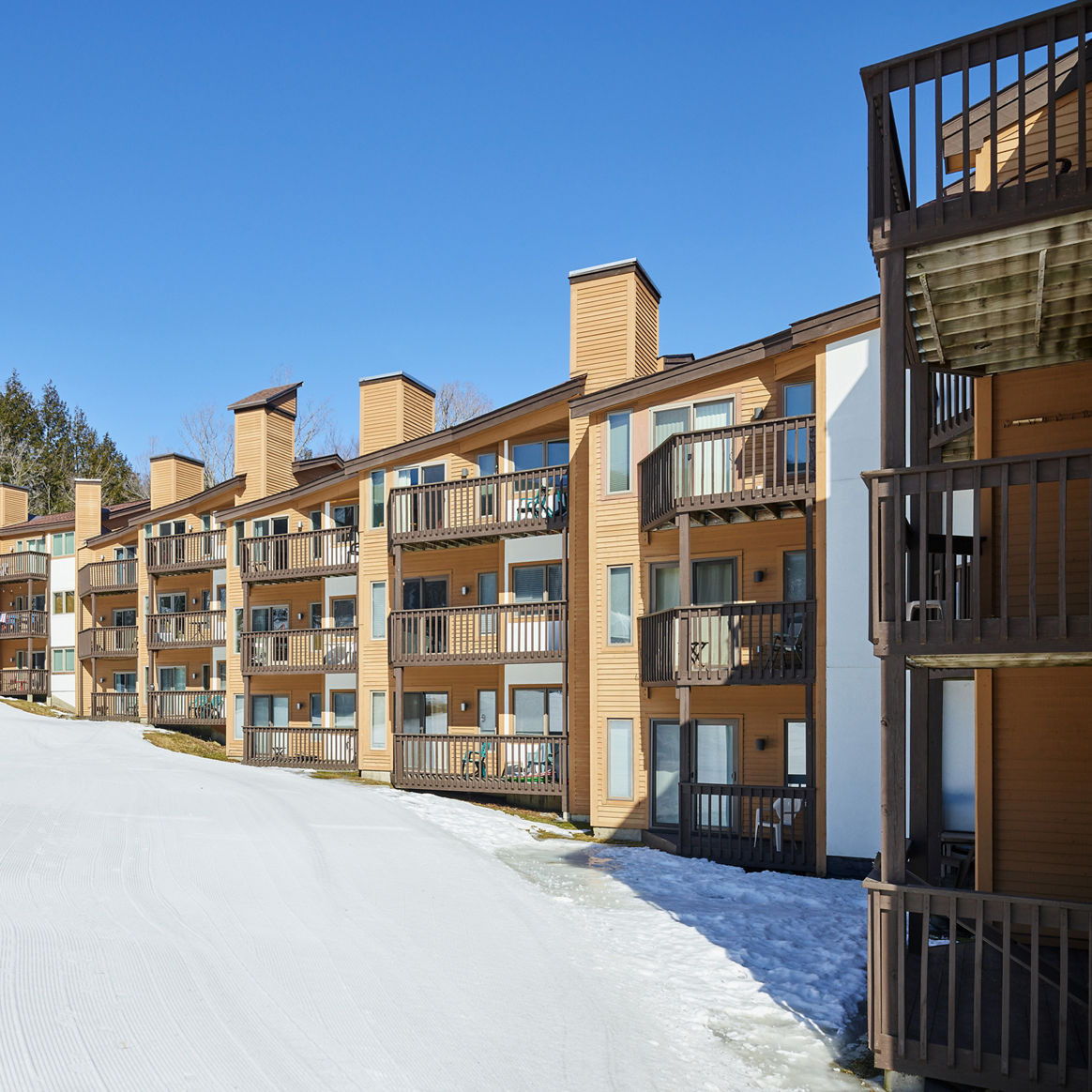 Exterior View of Snowy Mountain Lodge at Okemo