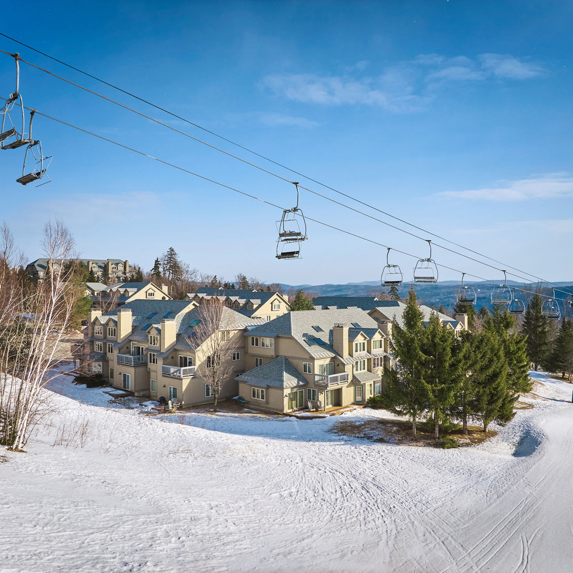 Aerial View of Snowy Solitude Village at Okemo