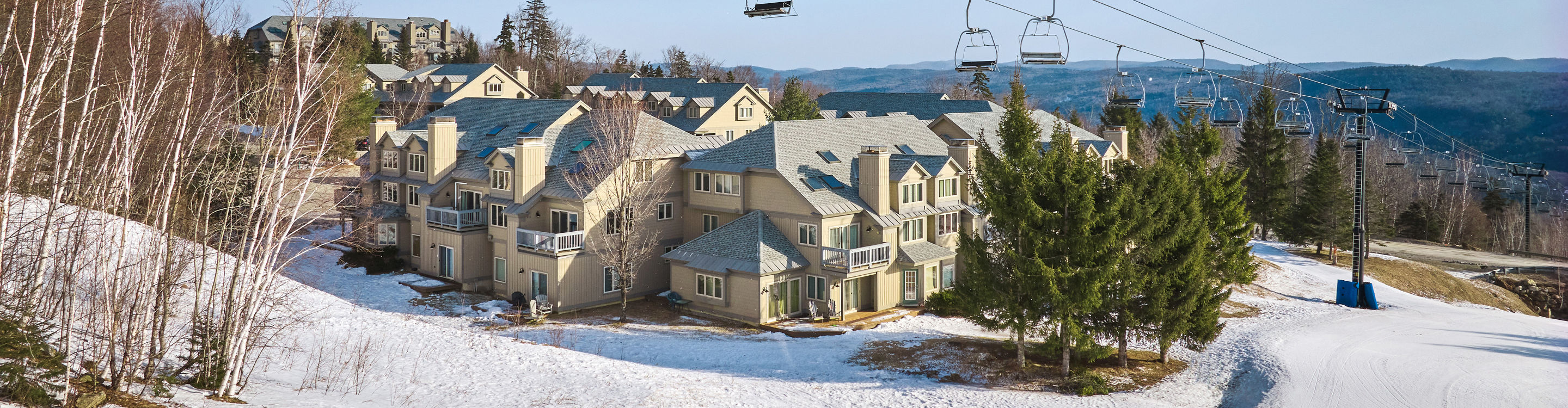 Aerial View of Snowy Solitude Village at Okemo