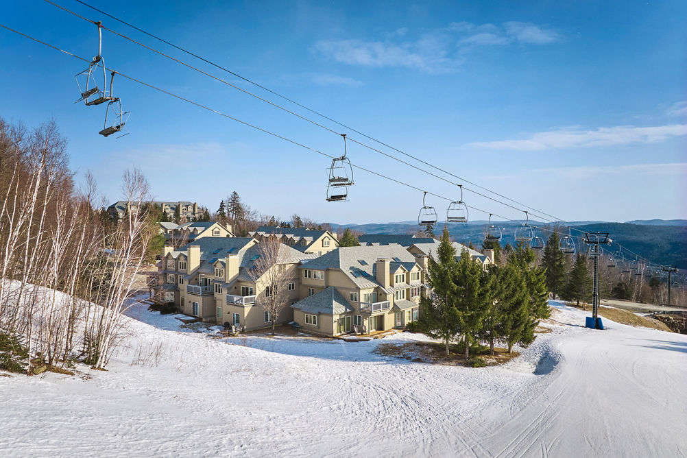 Aerial View of Snowy Solitude Village at Okemo