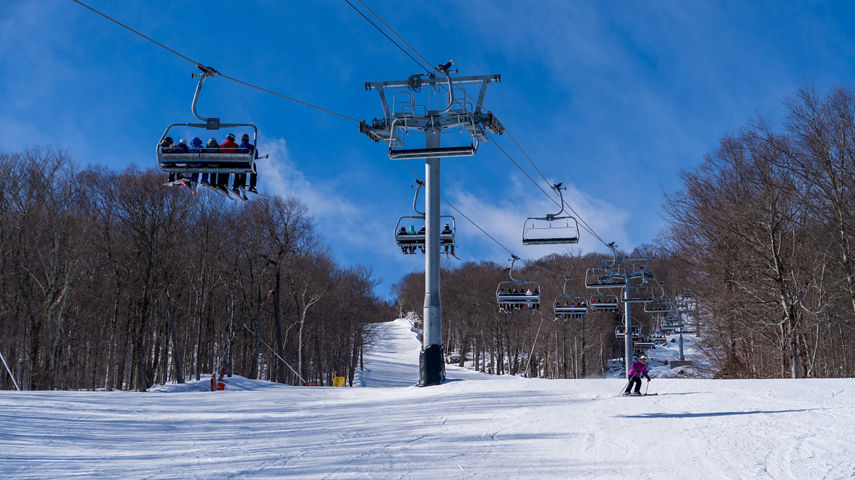 Resort Guests Ride Chairlift at Stowe