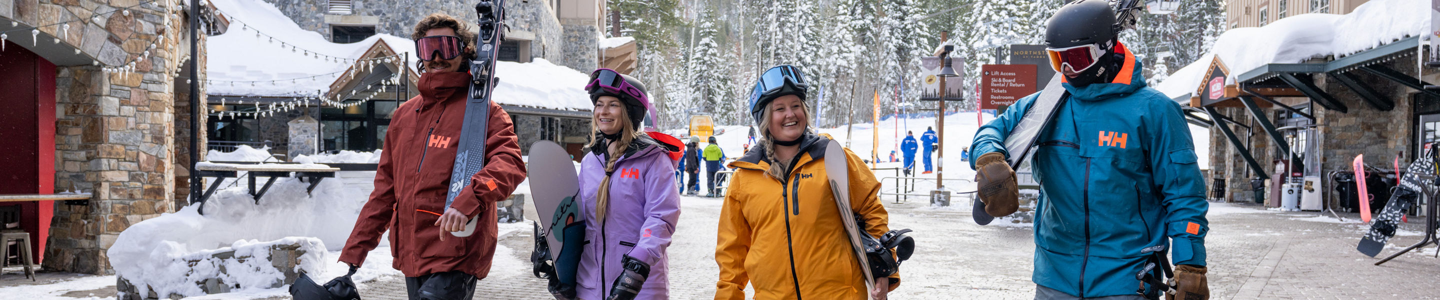 Friends Walk Around Northstar Base and Village Area with Ski Gear