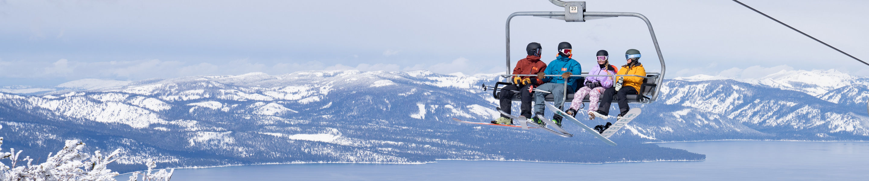 Group of Friends Ride Chairlift at Heavenly